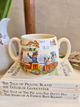 Load image into Gallery viewer, Bunnykins Royal Doulton "Bunny to the Town Station" Two handled Mug 2441
