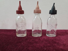 Load image into Gallery viewer, Vintage Doll Bottles 42601
