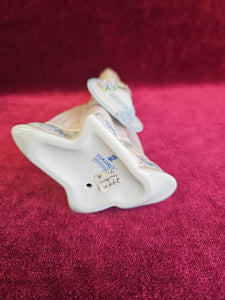 Lladro Sara Girl Holding Hat #56 42506