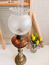 Load image into Gallery viewer, Antique Brass and Amber Glass Oil Lamp. 42412
