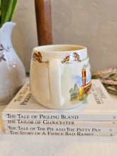 Load image into Gallery viewer, Bunnykins Royal Doulton &quot;Bunny to the Town Station&quot; Two handled Mug 2441
