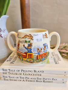 Bunnykins Royal Doulton "Bunny to the Town Station" Two handled Mug 2441