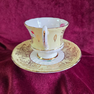 Paragon Yellow and Gold with Rose Teacup and Saucer 028